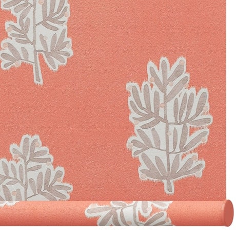 Stylish wallpaper with white leaf patterns on a coral background, ideal for interior design and decorating spaces.