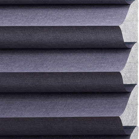 Black fabric window blinds with layered pleats, modern and sleek design, ideal for privacy and light control.