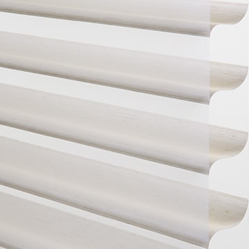 White horizontal blind louvers for window covering and privacy.