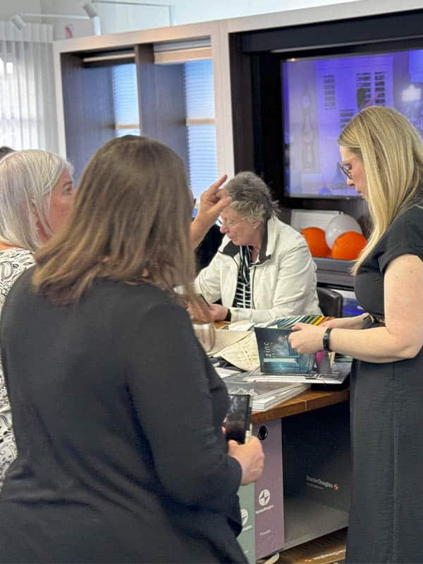 Blind magic team collaborating on accessibility solutions in a meeting room Canada.