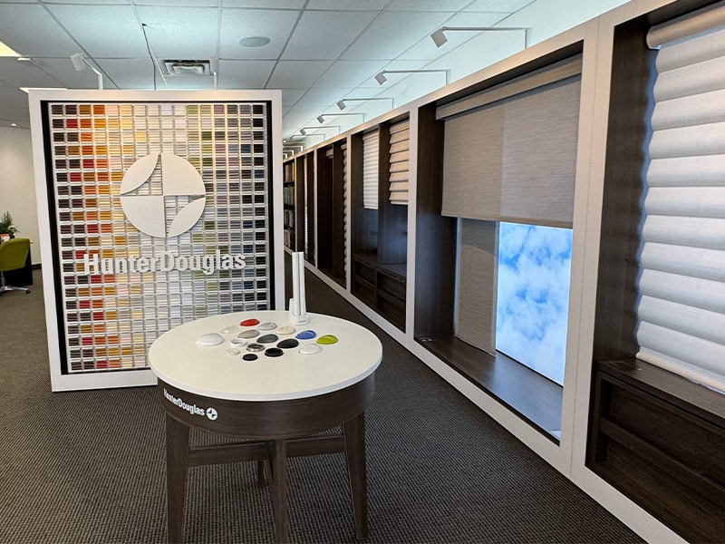 Colour sample display for Hunter Douglas window treatments.