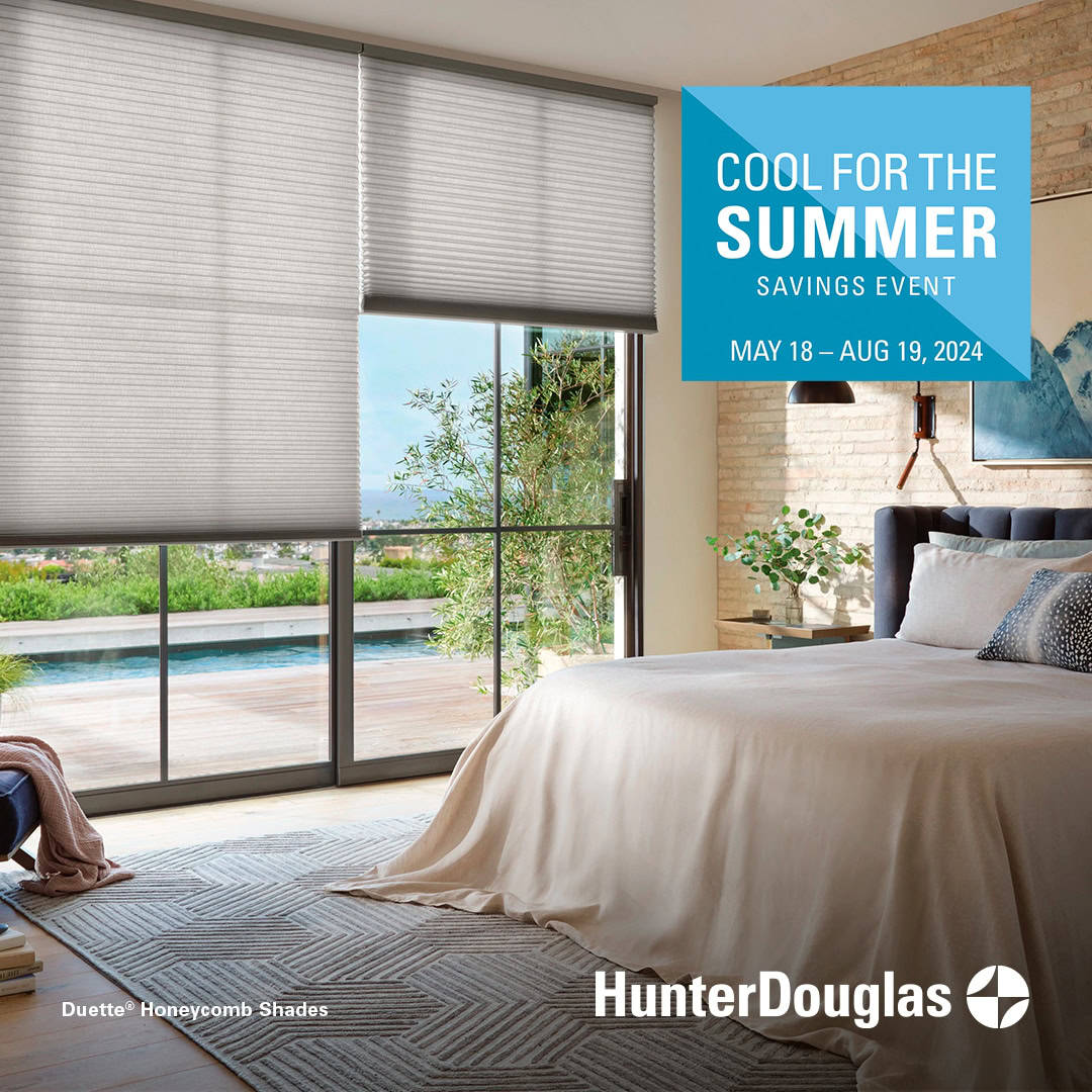 Luxurious bedroom with Hunter Douglas Duette honeycomb shades offering energy efficiency and privacy in modern home.