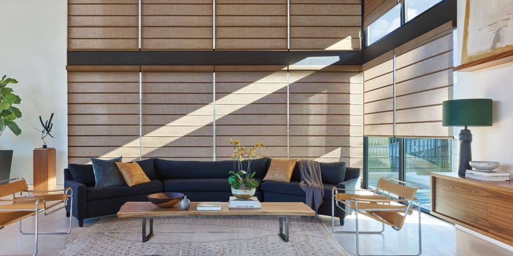 Bright living space featuring large windows, sleek furniture, and stylish design elements.