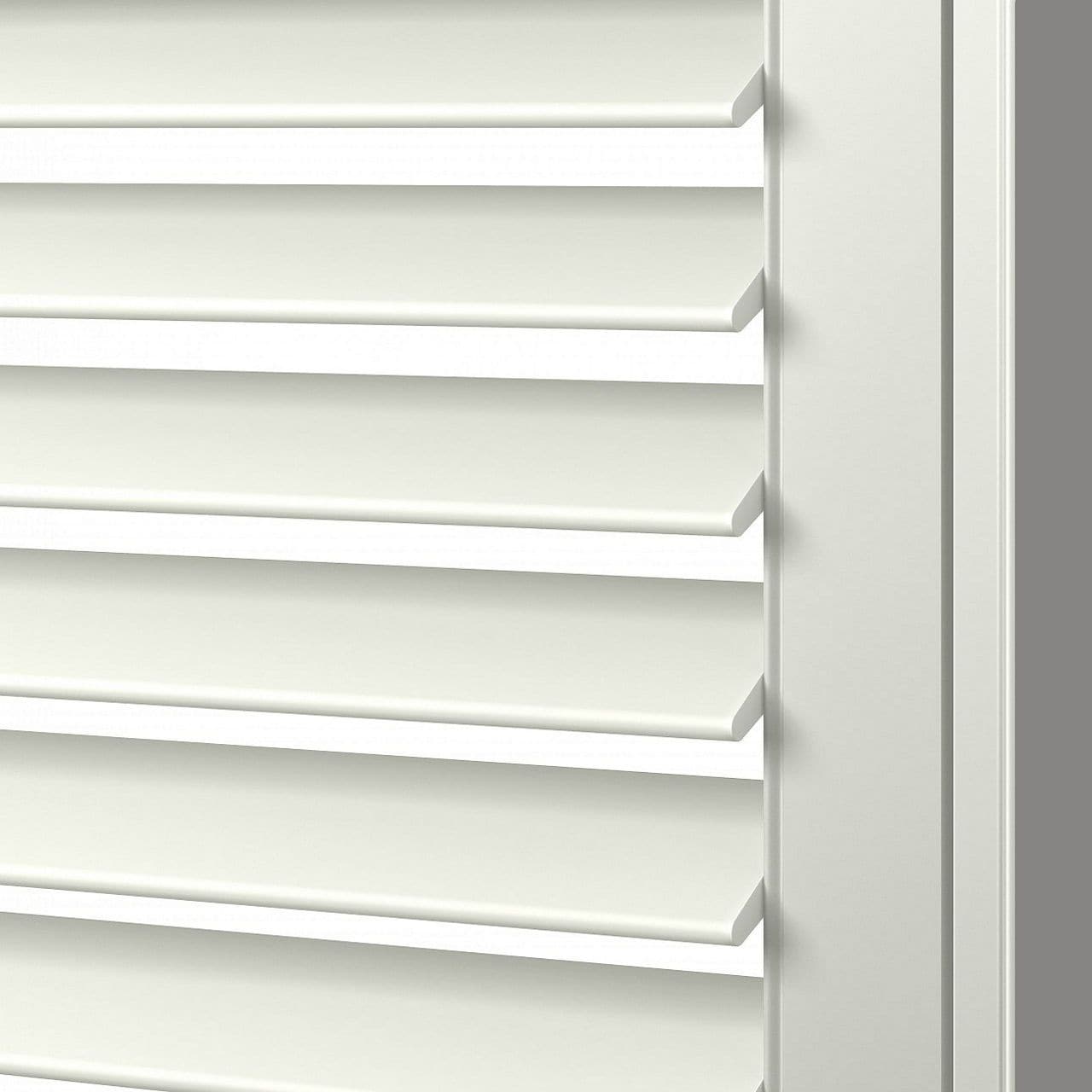 Close-up of white vinyl plantation shutters with adjustable louvers for light control and aesthetics.