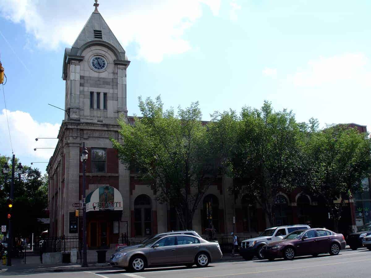 Old courthouse or city hall with classic architecture and prominent clock tower.