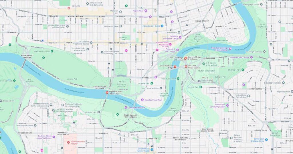 Detailed map showing river, streets, parks, and transit lines in an urban area.