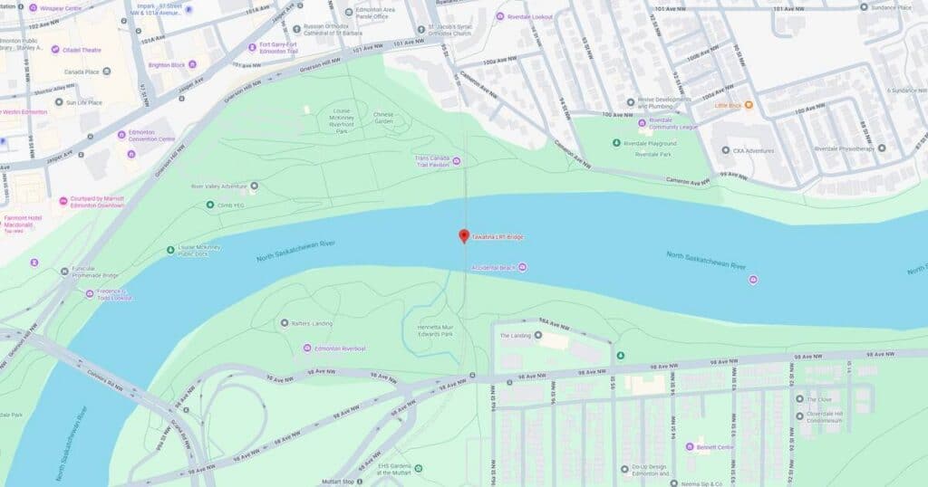 Scenic riverfront park with walking trails, green spaces, and city views, ideal for outdoor activities and relaxation.