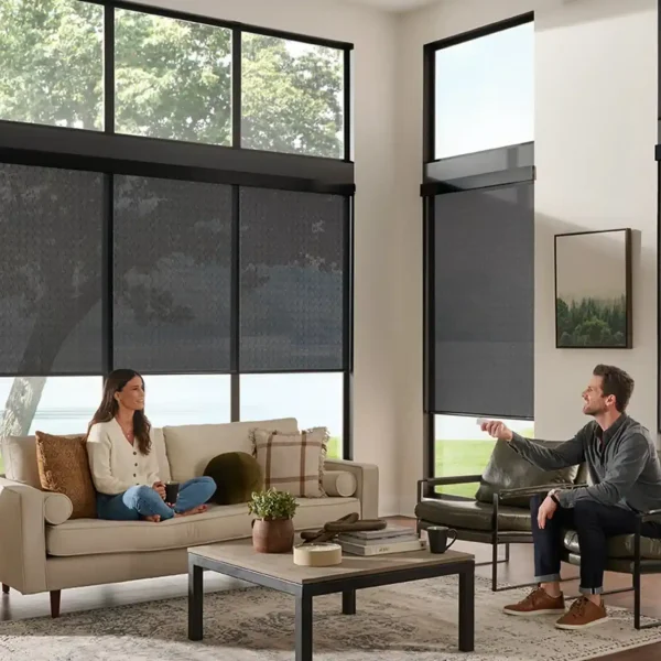 High-tech window blinds controlling natural light in a modern living room.