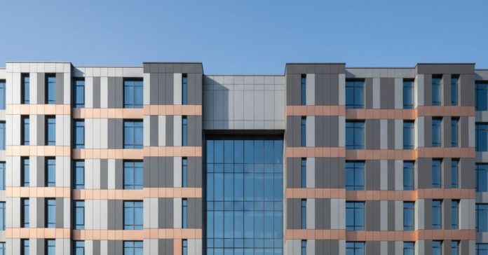 Modern commercial building façade with professionally installed ACP panels clean joint lines and premium exterior cladding finish