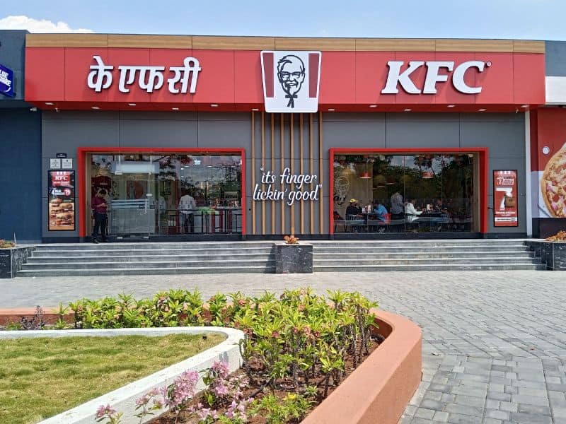 KFC Baramati outlet exterior with ACP panel façade and modern commercial signage design KFC Baramati outlet exterior with ACP panel façade and modern commercial signage design