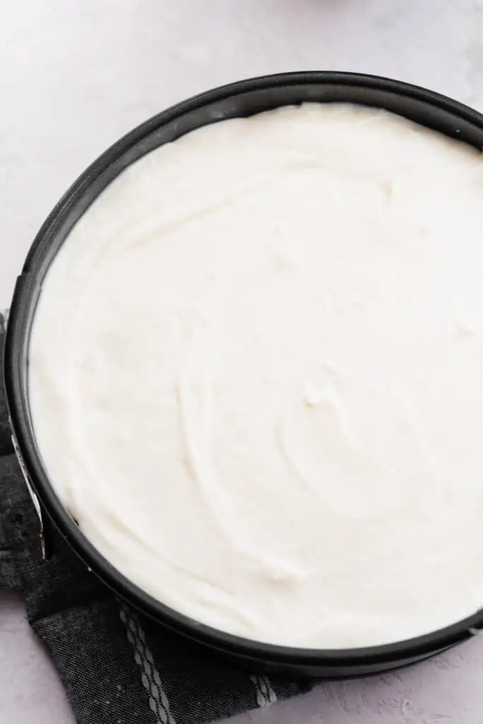 The cheesecake batter in the pan before being baked.