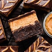 Buckeye brownies on a wire rack, with the visible peanut butter and brownie layers.