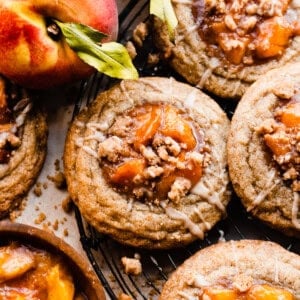 Peach cookies on a vintage wire rack.