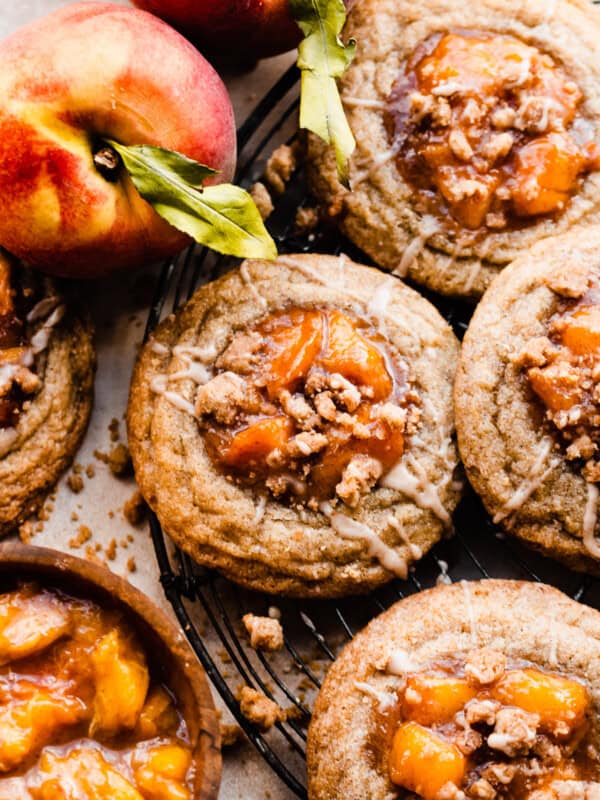 Peach cookies on a vintage wire rack.