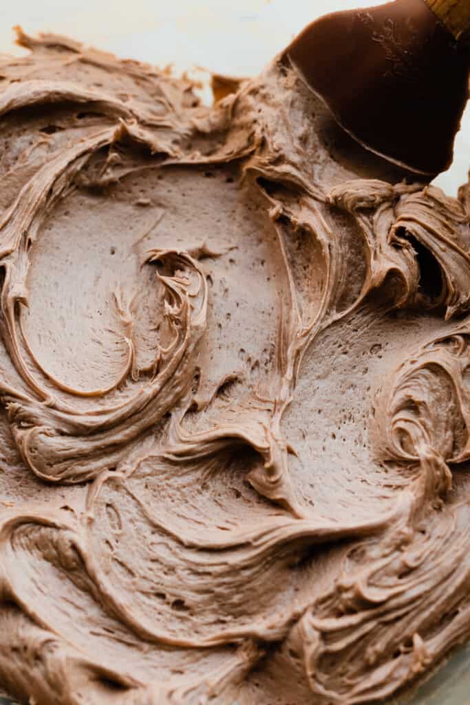 A close-up of a bowl of nutella frosting.