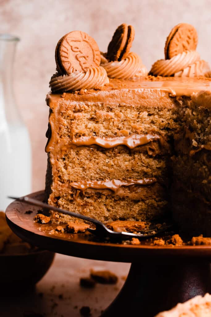 A close-up of the inside of the sliced open cake, showing the biscoff cake layers.