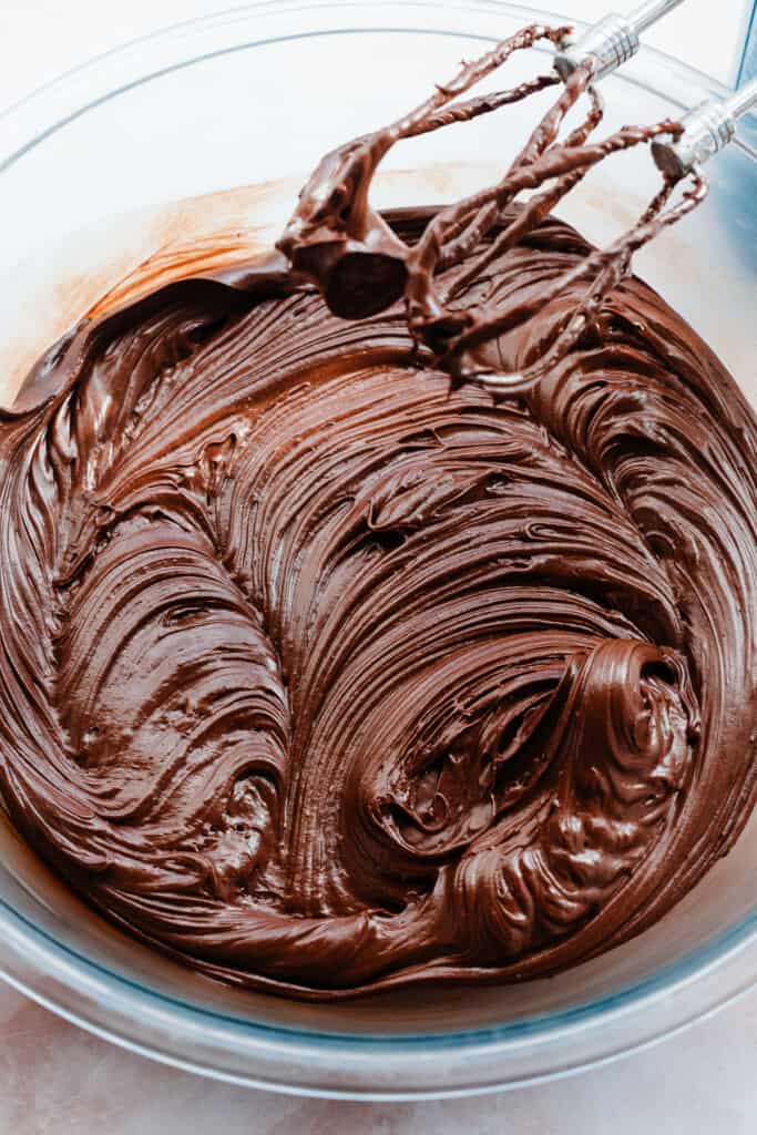 A bowl of luscious chocolate fudge frosting.