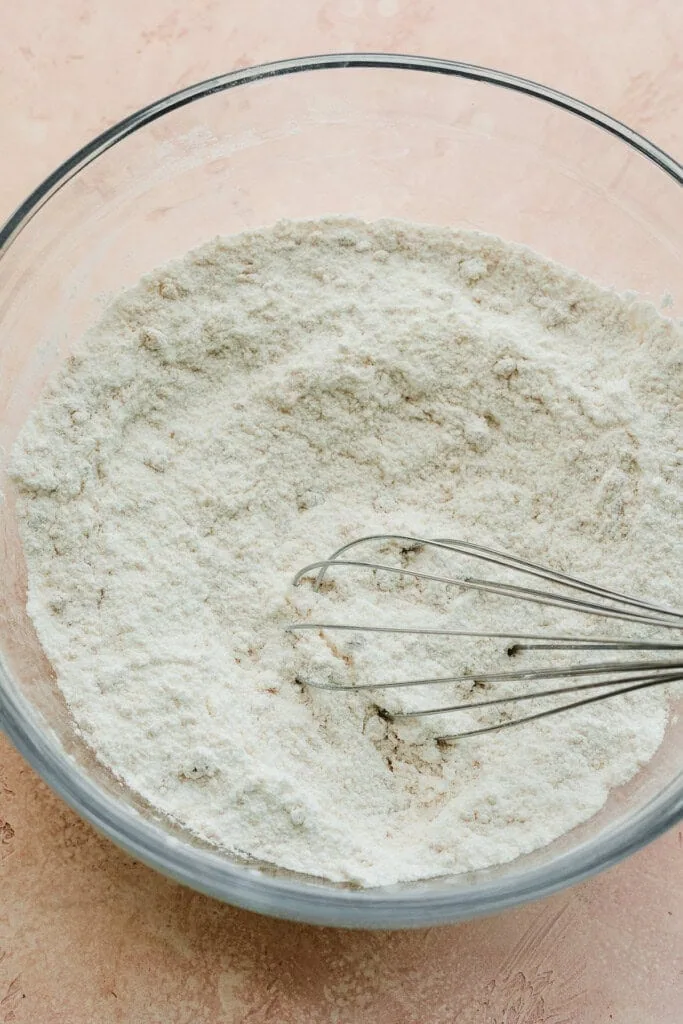 A bowl of the dry ingredients whisked together.