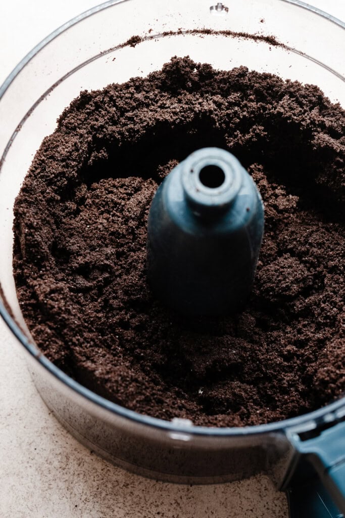 Crushed oreos in a food processor.