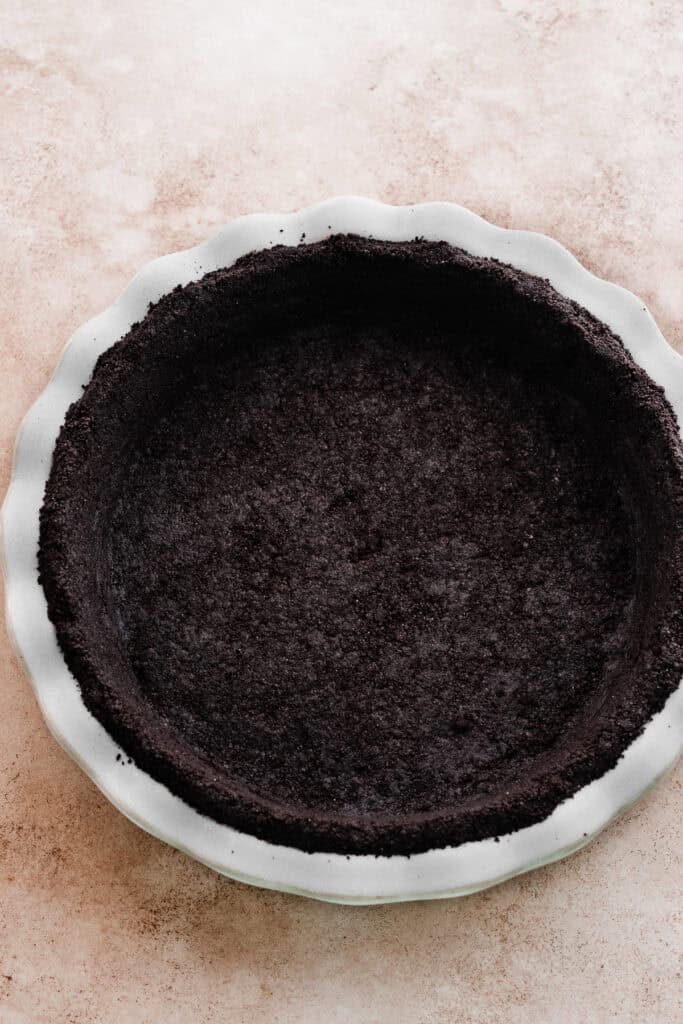 An oreo crust pressed into a 9-inch pie plate.