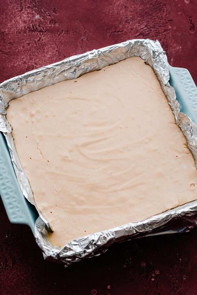 The chilled peanut butter fudge in the pan.