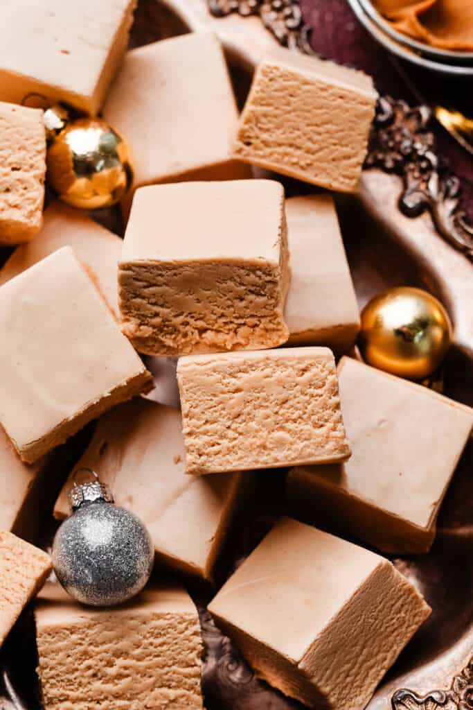 A close-up on the slices of fudge in a metal tray.