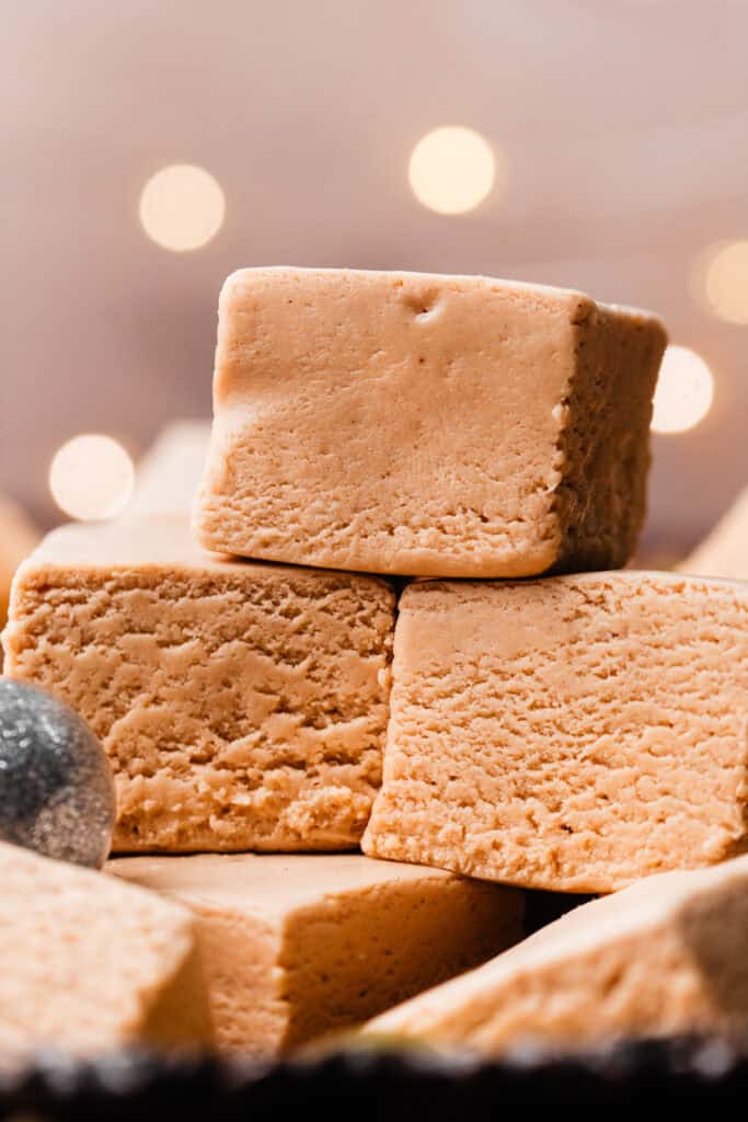 A close-up on a stack of pieces of peanut butter fudge.