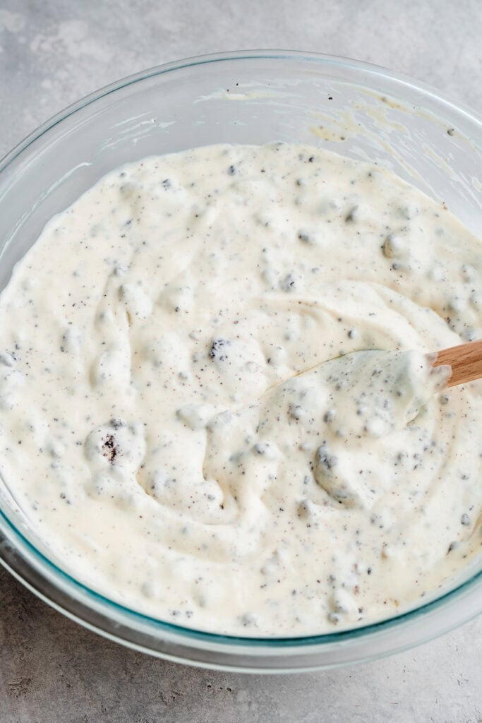 A mixing bowl of the finished cheesecake batter.