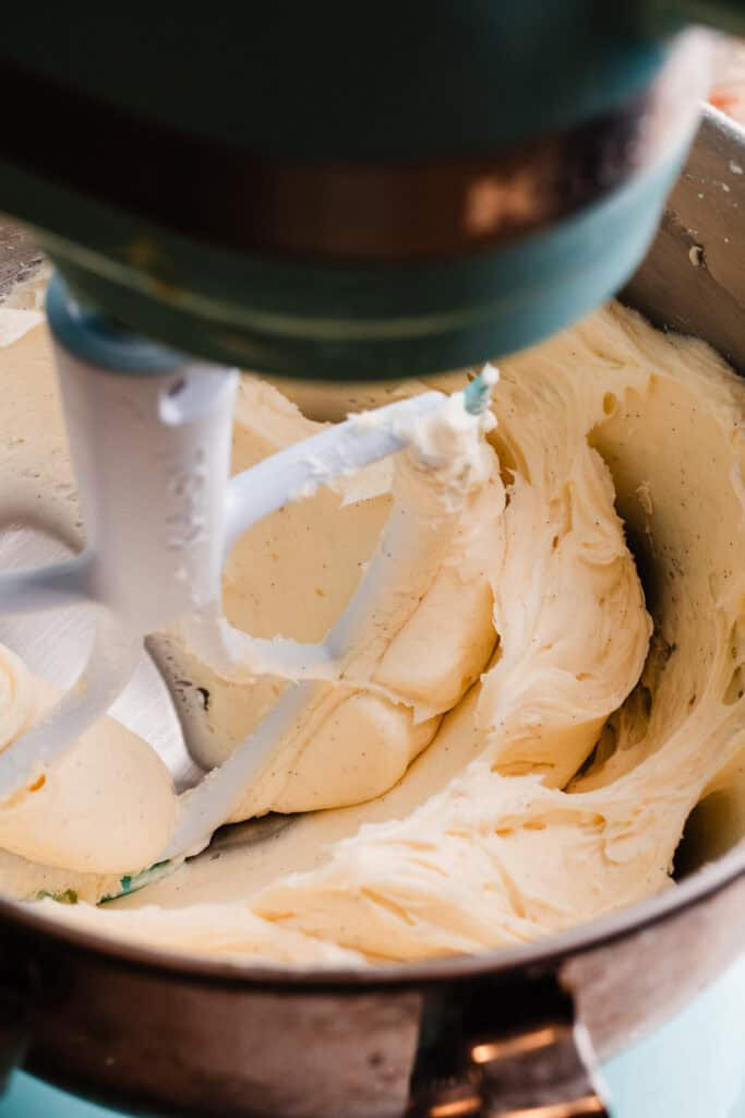 A bowl of lemon cream cheese frosting.