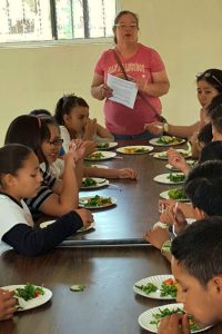 students eat fresh salad