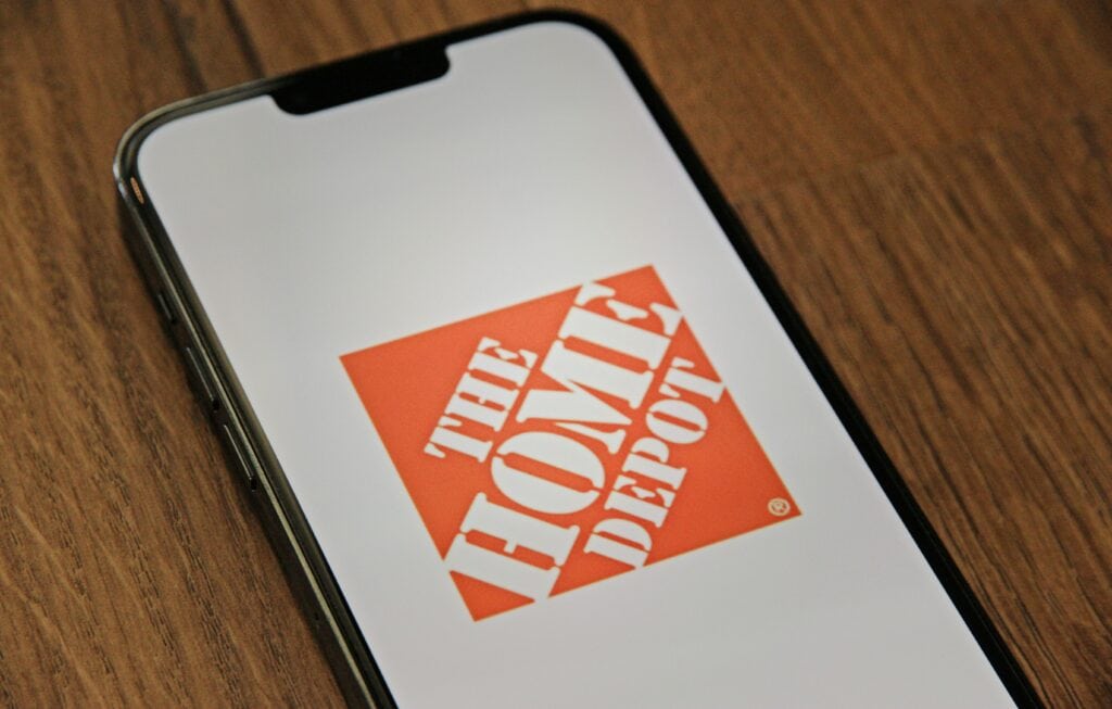 Image of Home Depot logo on iPhone. Photo by Marques Thomas.