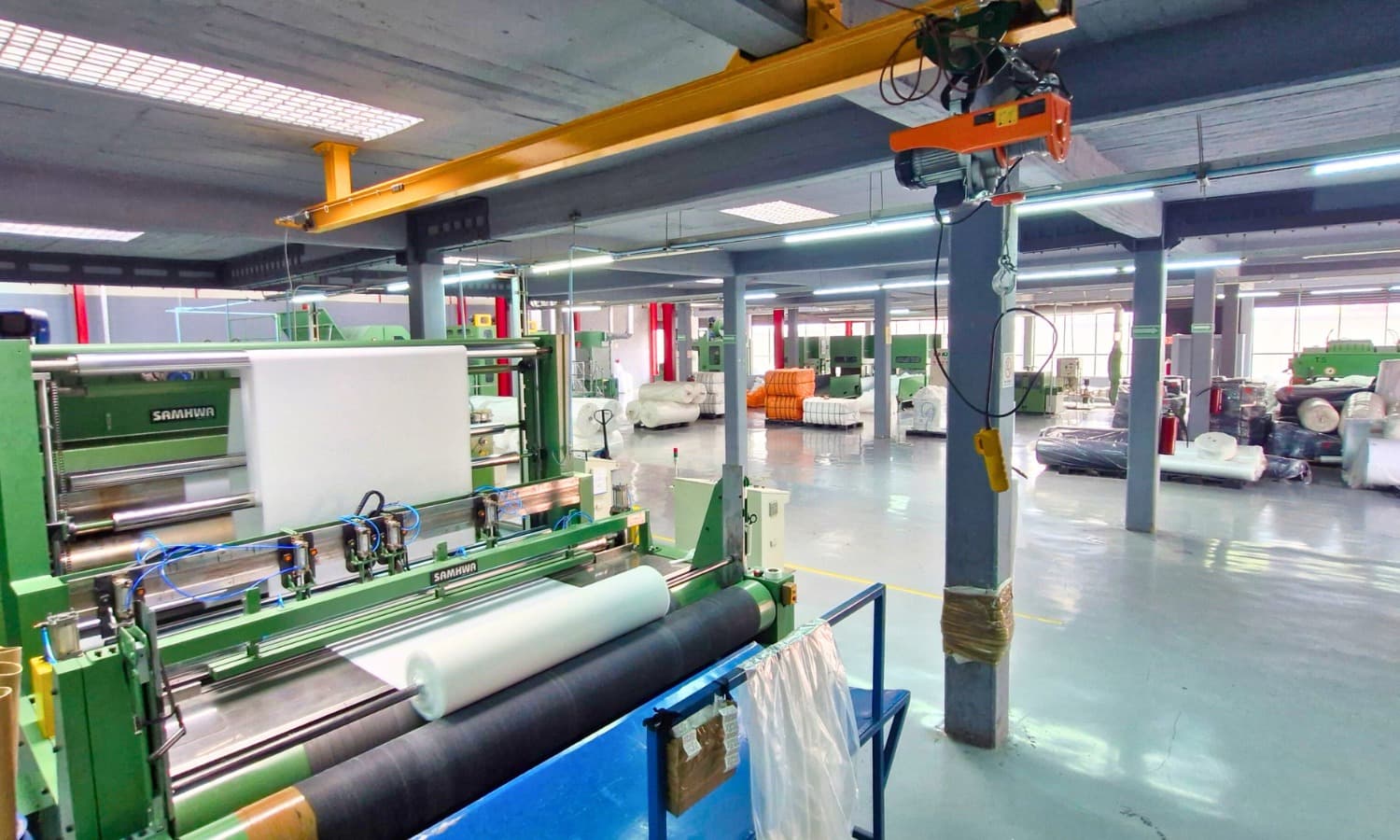 produccion de Tejido plano non woven de poliester EN ENTRETELAS BRINCO