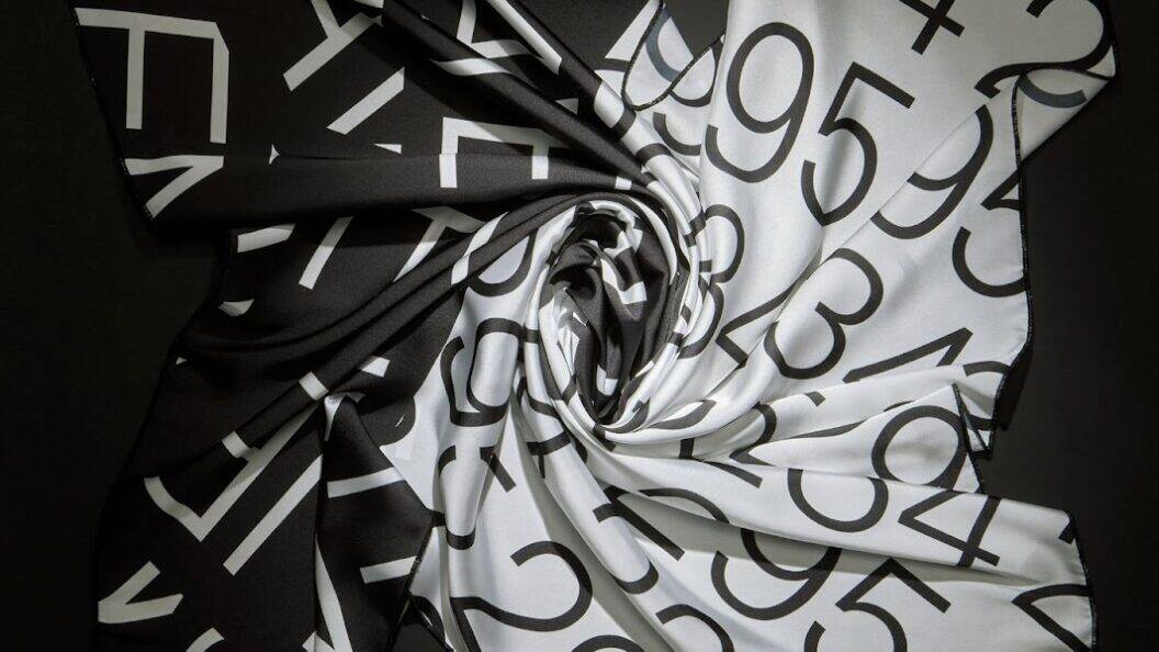 Discover How Typographic Motion Transforms Silk Scarves, Avant-Garde Wearable Art