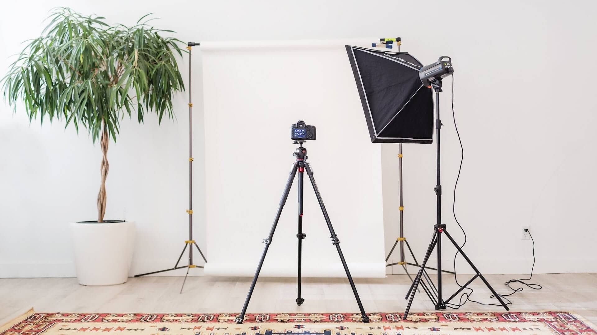 Professional photography studio setup with lighting, camera, and backdrop, showcasing high-quality kitchen images for Broadoak Kitchens Ltd SEO optimisation.