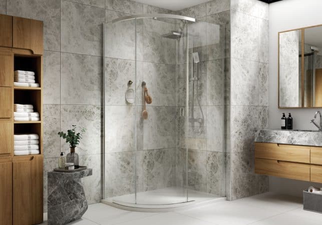High-end modern bathroom with walk-in shower, custom cabinetry, and natural stone tiles, showcasing bathroom renovation and design expertise.