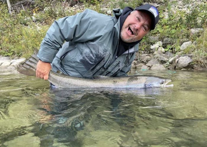 happy angler with gaspé salmon