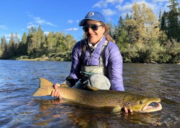 huge atlantic salmon caught by female angler in gaspé