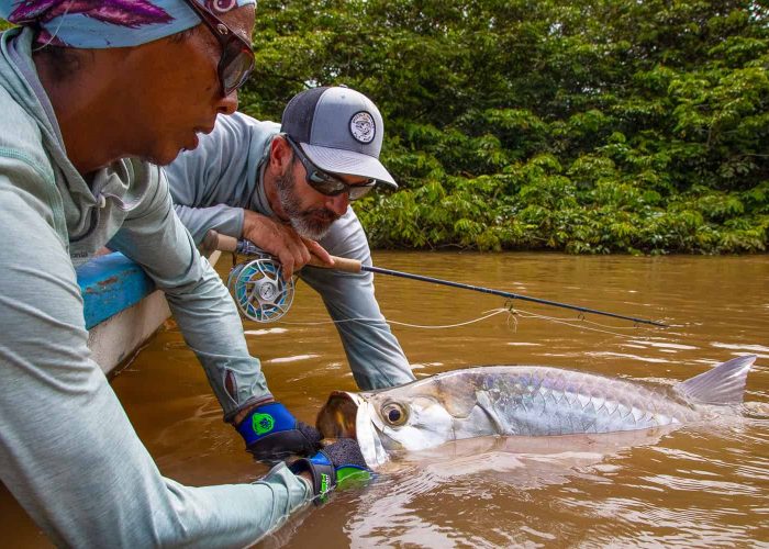 holding a tarpon in costa rica