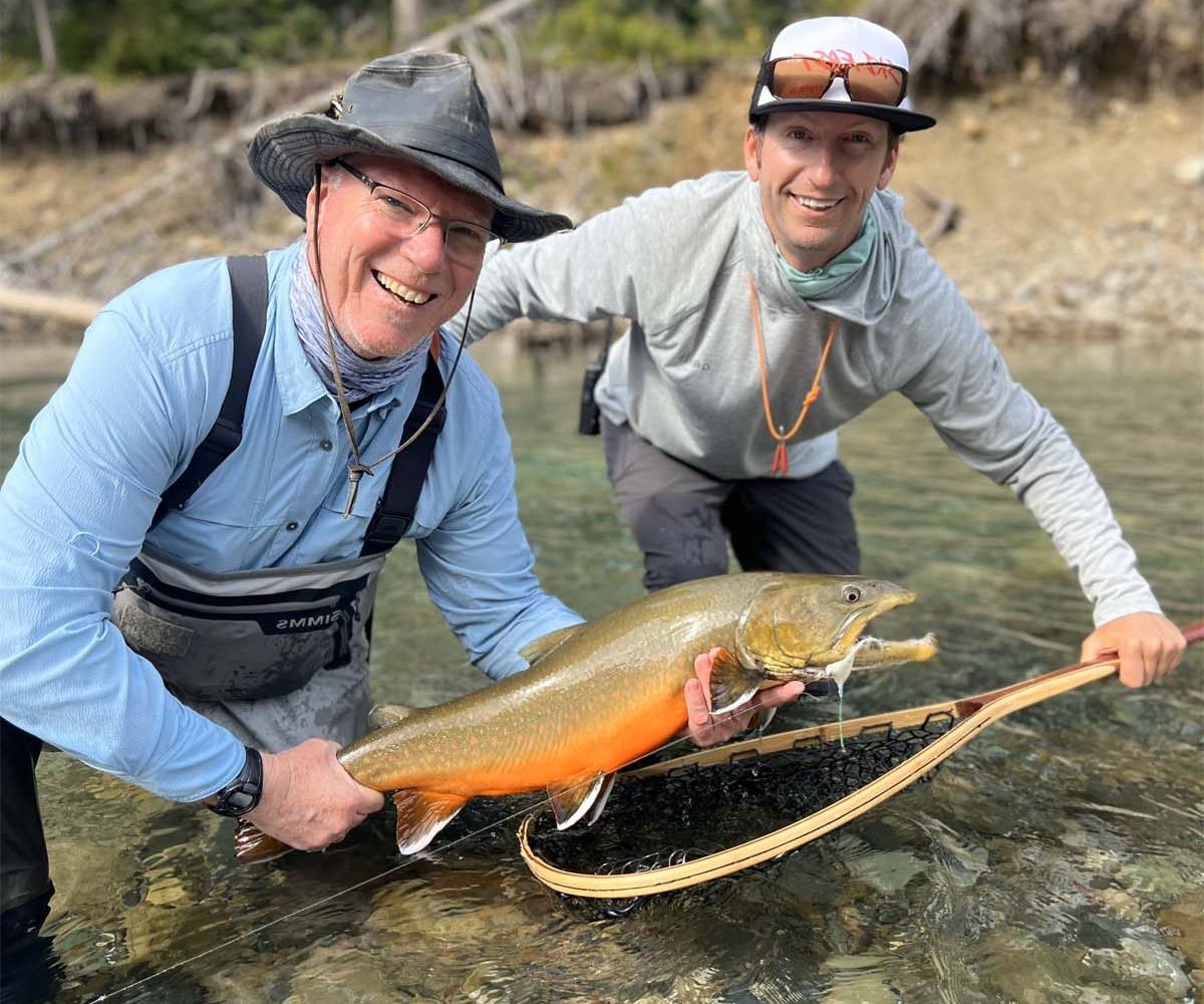 trophy bull trout caught while heli-fishing in british columbia