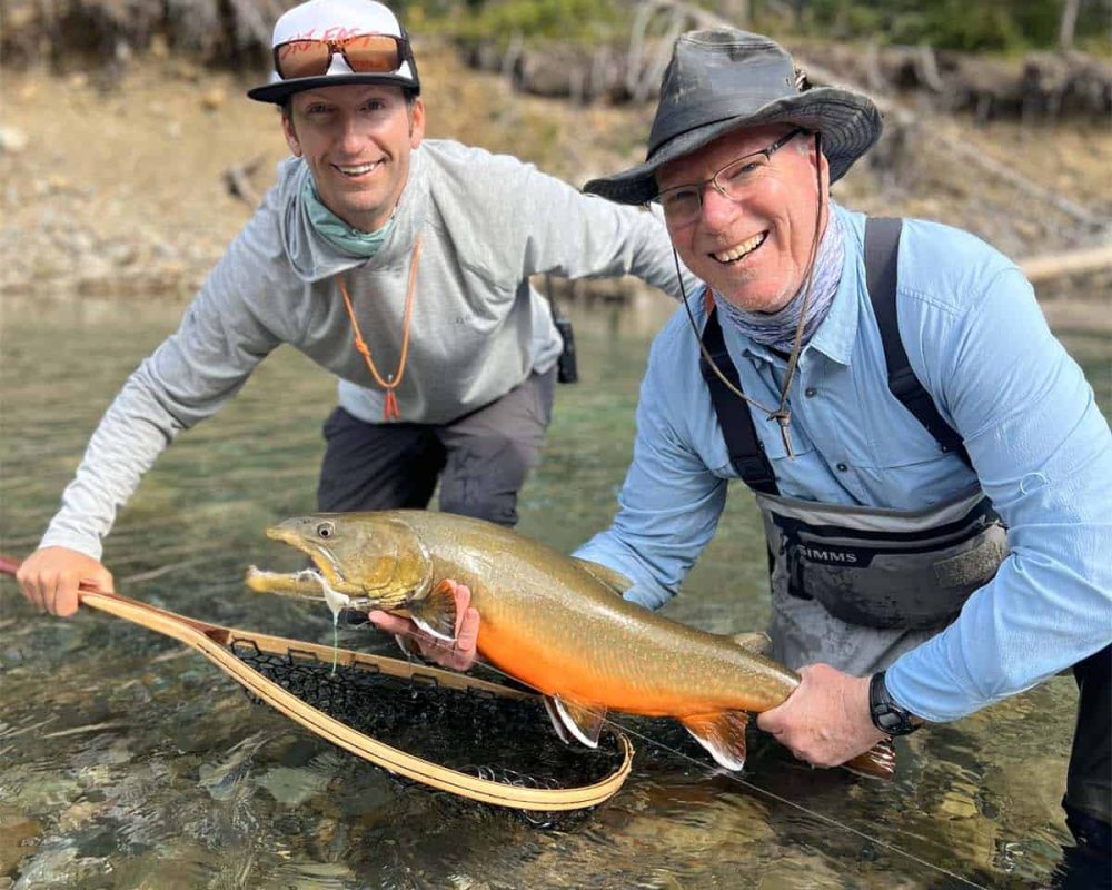 trophy bull trout caught while heli-fishing in british columbia