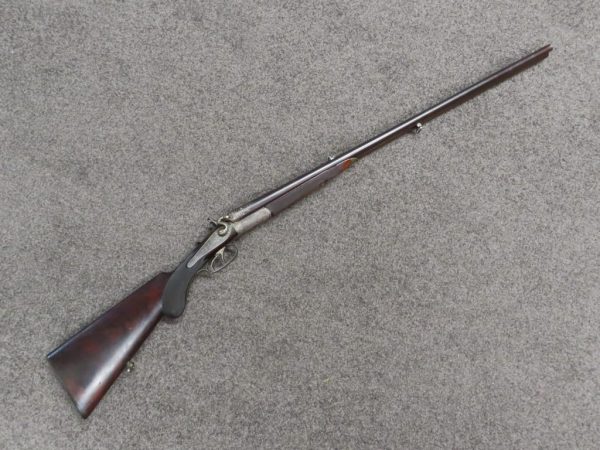 Antique rifle firearm, ideal for collectors, featuring classic design and historical significance.