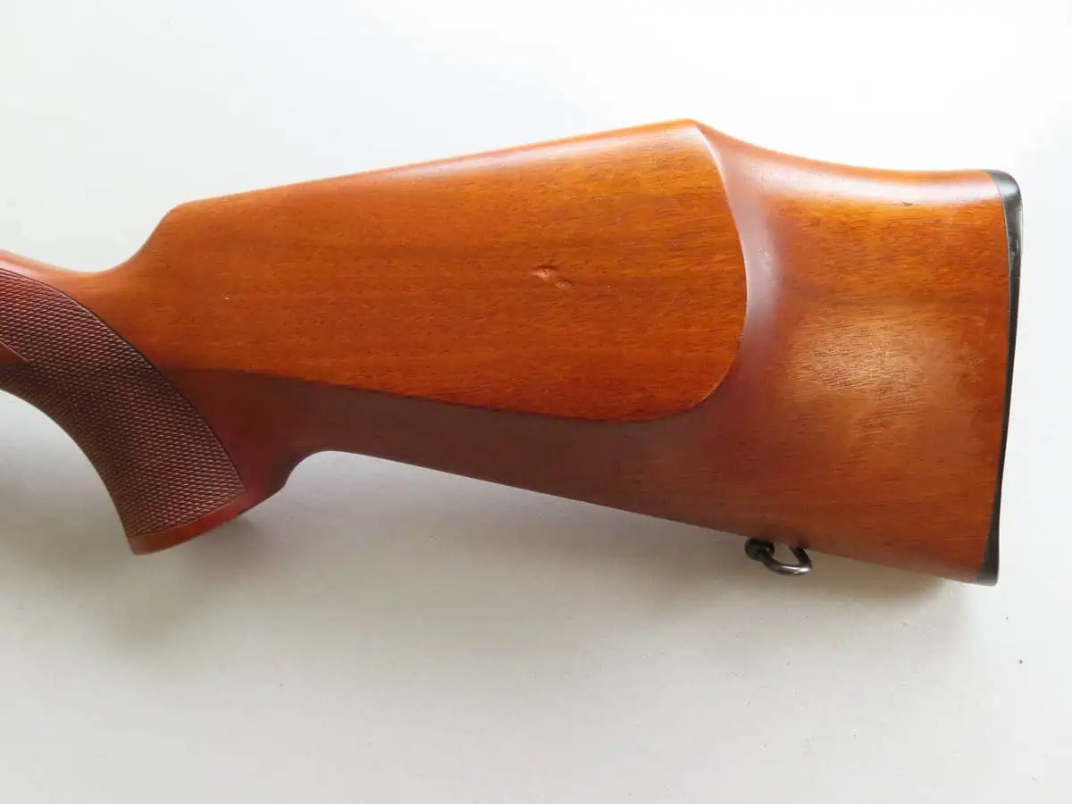 High-quality wooden rifle stock with smooth finish, ideal for traditional firearms and sporting guns.
