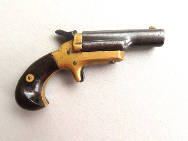 Old-fashioned toy cap pistol, vintage collectible from Colonial Ammunition Company, NZ.