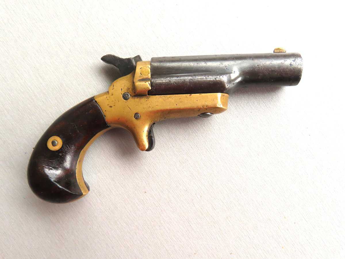 Old-fashioned toy cap pistol, vintage collectible from Colonial Ammunition Company, NZ.