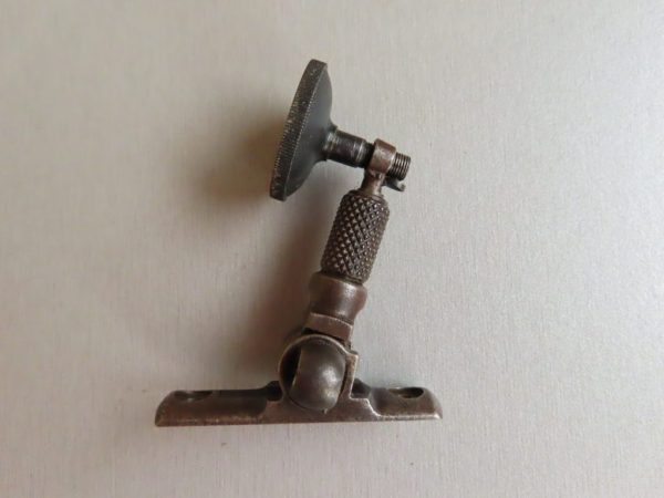 Antique gun cleaning accessory, used for firearm maintenance by Colonial Ammunition Company.