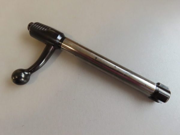 Antique firearm cleaning device from Colonial Ammunition Company, New Zealand, ideal for collectors.