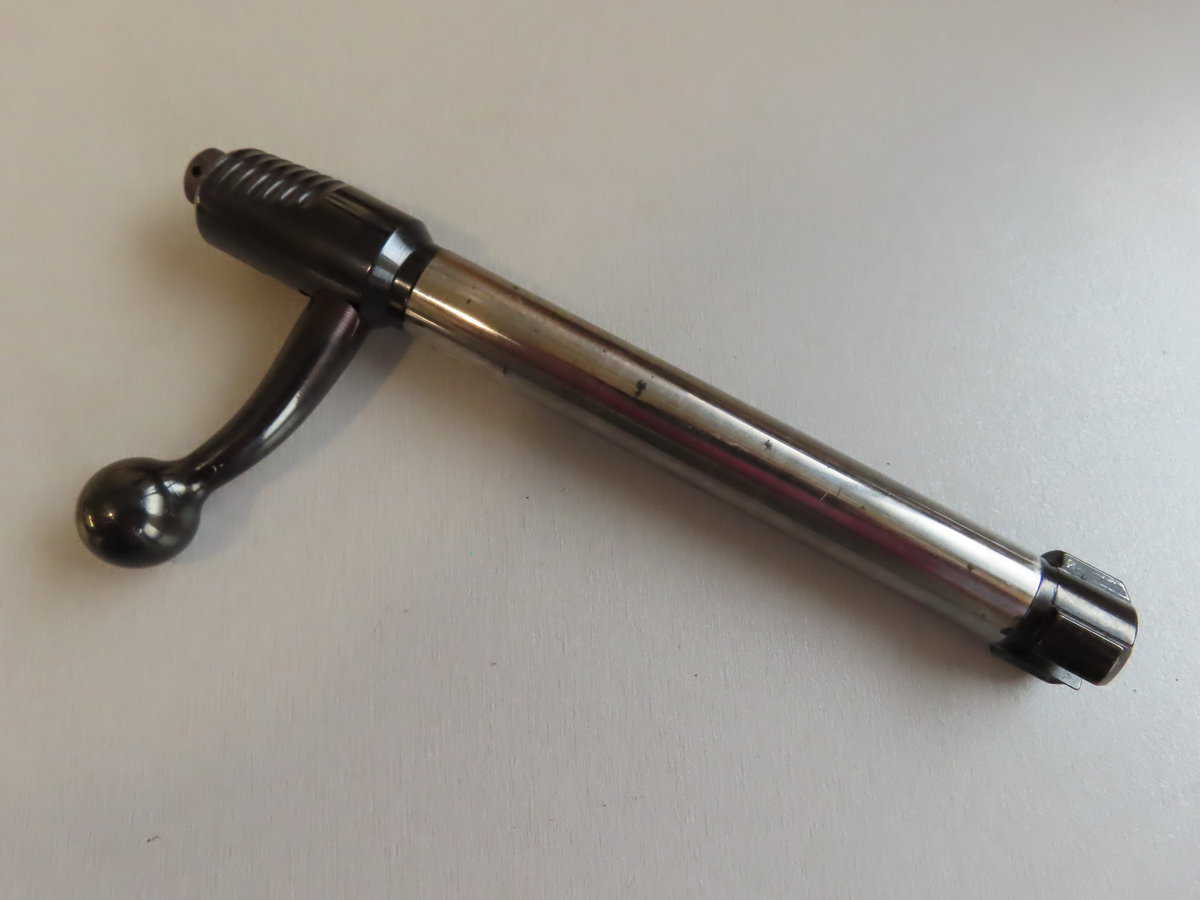 Antique firearm cleaning device from Colonial Ammunition Company, New Zealand, ideal for collectors.