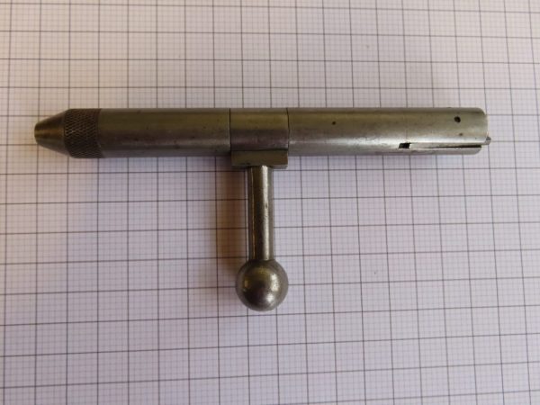Antique firearm tool from Colonial Ammunition Company for gun maintenance or reloading.