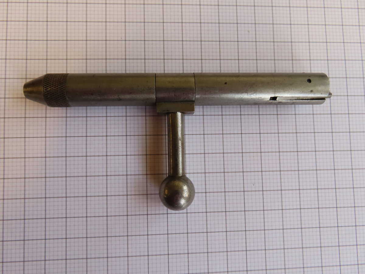 Antique firearm tool from Colonial Ammunition Company for gun maintenance or reloading.