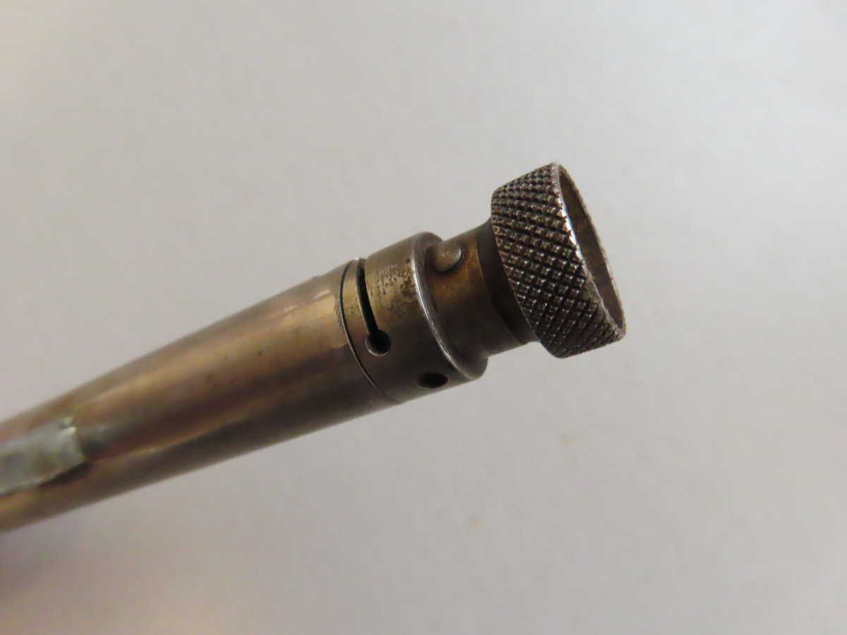 Historical industrial tool used in ammunition manufacturing at Colonial Ammunition Company.